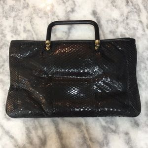 Vintage black leather handbag clutch